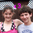 Two people in a group pose with one arm around each other, wearing a pink top and a white shirt, with pink text reading 'x3 i love you' above them.