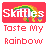Pixelated icon with red header displaying 'Skittles' text and rainbow graphic, followed by 'Taste My Rainbow' in multicolored letters
