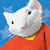 A split-frame contact sheet showing a pixelated white cat mascot in an orange shirt on the left and green text reading "Original Icons .com" on the right against a blue background.