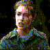 Six pixelated frames of a person in blue denim jacket and light blue shirt against dark background, showing sequential facial expressions from neutral to smiling.