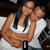 A pixelated image of two people in a close embrace, with text changing across four