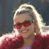 Animated contact sheet showing a woman with blonde hair and red sunglasses in two frames, alongside a blue background with pixelated text reading "CoolBuddy.com".
