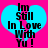 Two identical heart-shaped icons with cyan fill and black text on a bright pink background, each displaying "Im Still In Love With YU!" in pixelated font.