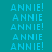 A static image with four quadrants displaying repeated 'ANNIE!' text in cyan on teal, light blue, pink, and light blue backgrounds.