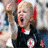 A pixelated image shows a child in dark clothing with red accents, mouth open in a shout or cheer, next to blue background text reading "True Red Sox fans learn young".