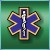 A pixelated medical symbol with a blue and gold cross-like shape on a green gradient background.