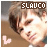 A pixelated image of a person with light brown hair and fair skin, featuring text above the head and a heart symbol below.