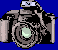 Pixelated camera icon with gray body, black accents, and lens details on blue background; one version shows green flash effect.