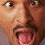 Pixelated close-up of a person's face with mouth open, showing teeth and tongue in two side-by-side frames.