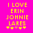 Yellow pixelated text on bright pink background reads "I LOVE ERIN JOHNNIE LARES" with four asterisks below, two yellow and two orange.