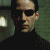Four pixelated show a person in dark turtleneck and sunglasses with varying lighting and color tones across the