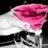 A static pixelated image shows a stylized pink and white object with black accents against a dark background.