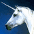 A split-screen image shows a white unicorn head on the left against a dark blue background, and bold red text on the right over a rainbow striped background.