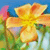 Pixelated image of a yellow-orange flower with orange-red accents on petals, green foliage, and a blue background.