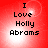 Red background with white gradient center displaying 'I Love Holly Abrams' in black pixelated text across four