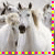 Animated sequence of a white dog with brown ears and black eyes, mouth open in a panting expression, against a light background.