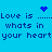 Blue background with pixelated text repeating 'Love is what's in your heart' and blue heart/sparkle icons, animated to cycle through dotted lines.