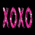Pink XOXO text in a pixelated style on black background with gray corner, no visible animation changes.