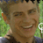 Pixelated static image of a person's face with green background and partial white text on the right side, likely from an old AOL Instant Messenger buddy icon.