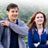 Pixelated static image of two people standing side-by-side with one person's arm around the other, wearing casual clothing against a blurred background.