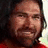 Pixelated image of a person with long dark hair and beard wearing red clothing, alongside text reading "He sold His soul" and "Johnny Damon".