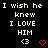 Pixelated text and symbols on a black background with red heart icons, arranged in three of repeated phrases