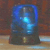 Blue rotating light with dark base, showing sequential illumination states across six