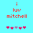 Red pixel text 'i luv mitchell' on cyan background with pink and purple heart symbols below, two variations of the heart arrangement.