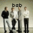 Four pixelated figures stand in a row beneath black block letters spelling 'bsb' on a muted background.