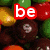 Pixelated image of colorful candies with overlaid text fragments in red, orange, yellow, green, cyan, and purple outlines.