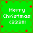 Green pixelated background with red star-like shapes and white text reading "Merry Christmas <333!!!" arranged in a pattern