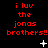 Red text on black background reads "i luv the jonas brothers!!" with white star and dot animations.
