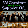 *N Constant Support Of... text appears above a group of five men in dark clothing; the green 'NSYNC' logo animates with changing background and weapon effects.