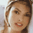 Static 48x48 pixel icon showing a close-up of a woman's face with brown hair, visible facial features including eyes, nose, mouth, and skin texture rendered in low-resolution pixels.