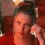 A four- shows a person in a red top with dark hair styled up, holding a silver object near their face in the top-left , then lowering it in the top-right, bottom-left, and bottom-right