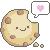 Pixelated cookie icon with smiling face, brown spots, and speech bubble containing pink heart shape.