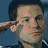 A 48x48 pixel animated contact sheet showing two frames of a Battlestar Galactica-themed buddy icon with a character saluting and a spaceship in space.
