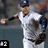 Pixelated image of a person in a white uniform with dark sleeves and cap, holding a bat in a batting stance against a blurred background.