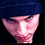 Four- shows pixelated images of a person in blue beanie, black background, and text reading 'Eminem be my Superman' on dark green