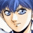 A pixelated anime-style character with blue hair and light skin on the left, next to a black background with white text reading "Anime IM" and "COM" in stylized fonts.