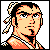 Pixelated 8-bit style character portrait with orange and black color scheme, featuring a person with tied hair and checkered patterns on clothing against gray background.