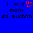 Blue background with black text reading "i love mark so muchhh" and a red pixelated heart symbol replacing the 'o' in 'love'.