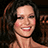 A 48x48 pixel buddy icon featuring a woman with dark hair and red lipstick smiling, alongside green text elements on black and gray backgrounds in a contact sheet layout.