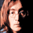 A 3x3 contact sheet of pixelated animated frames featuring a person with reddish-brown hair and glasses, alongside repeated text "THE BEATLES" on light blue backgrounds with torn edges.