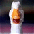 A pixelated vertical icon shows a white cylindrical object with an orange top and brown section, set against a dark gradient background.
