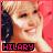 Pixelated static icon featuring a stylized face with pink and beige tones, dark hair on the left side, and bold text reading "HILARY" at the bottom in magenta letters against a black background.