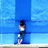 Animated icon shows a person in white top and dark shorts standing against blue background, shifting stance across frames