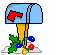 A blue mailbox with a red flag, yellow post, and green holly with red berries; a hand places a red ornament into the mailbox.