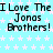 Pixelated text repeats 'I Love The Jonas Brothers!' on a light blue star-patterned background with a gray rectangle in the bottom-right corner.