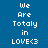 Blue background with white pixelated text "We Are Totally in LOVE<3" arranged in two , each having a highlighted
